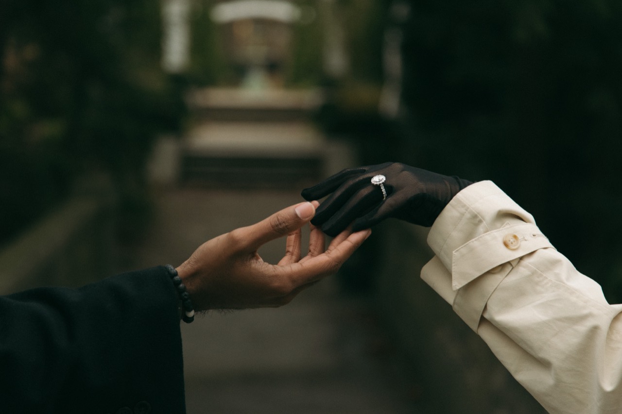 Engagement hands touching with an engagement ring